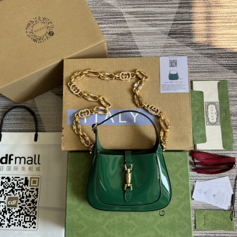 G*u*i top handle bags